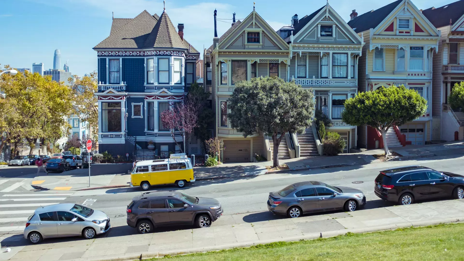 Cars parked in front of the Painted Ladies