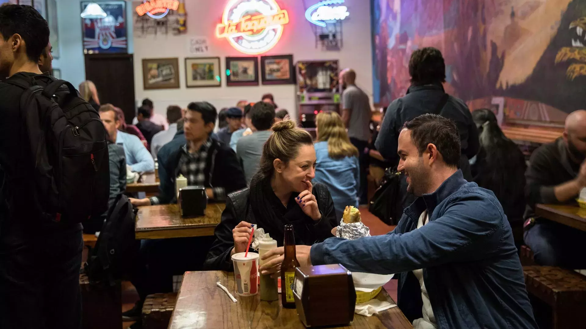 Visitors enjoy authentic Mexican food in San Francisco's Mission neighborhood.