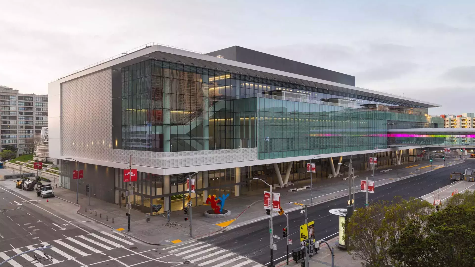 A wide shot of the glassy, modern Moscone Center South building.