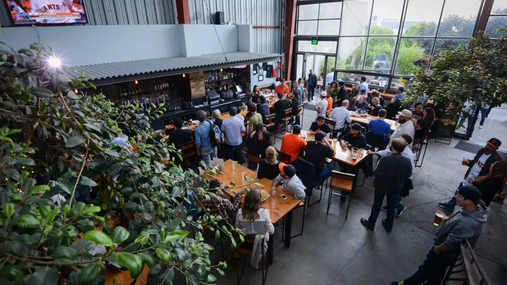 Patrons eat and drink at Southern Pacific Brewing in San Francisco.