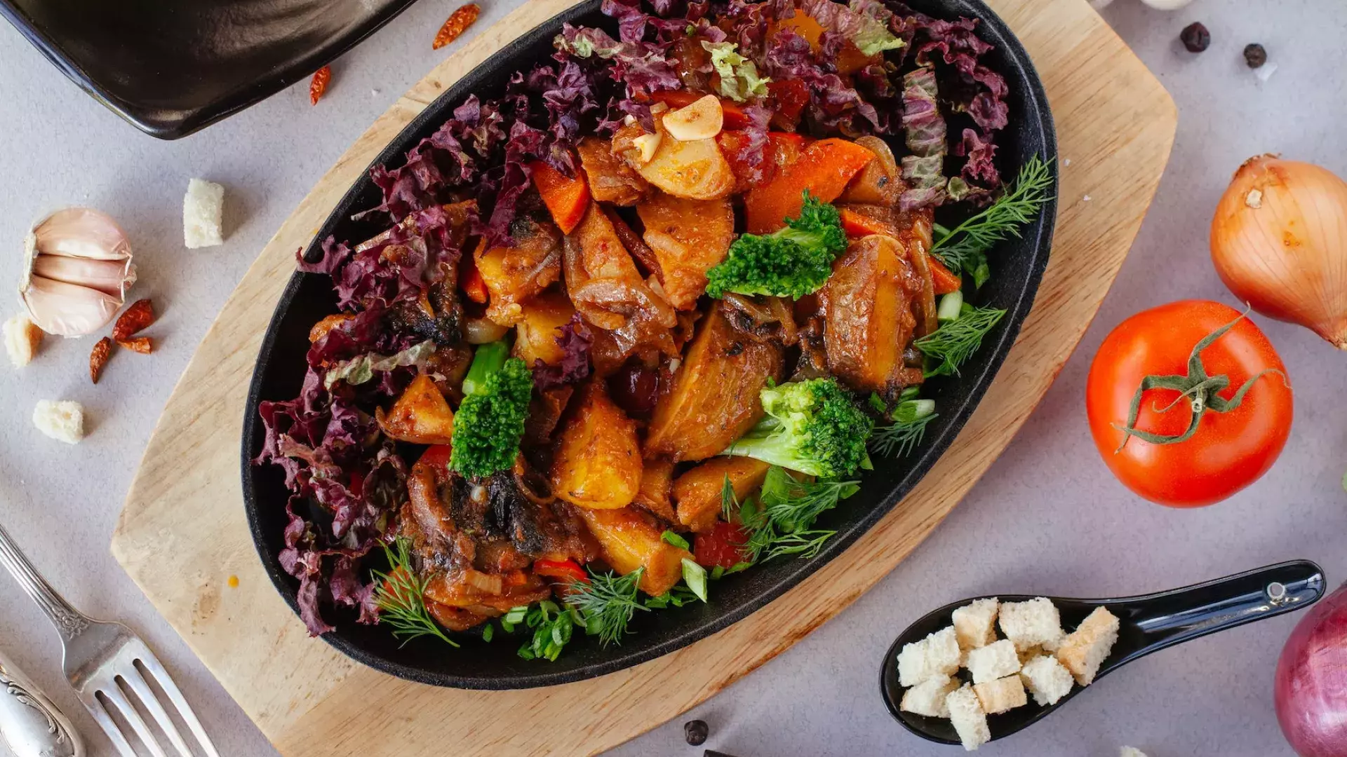 A table full of delicious vegetarian and vegan dishes.