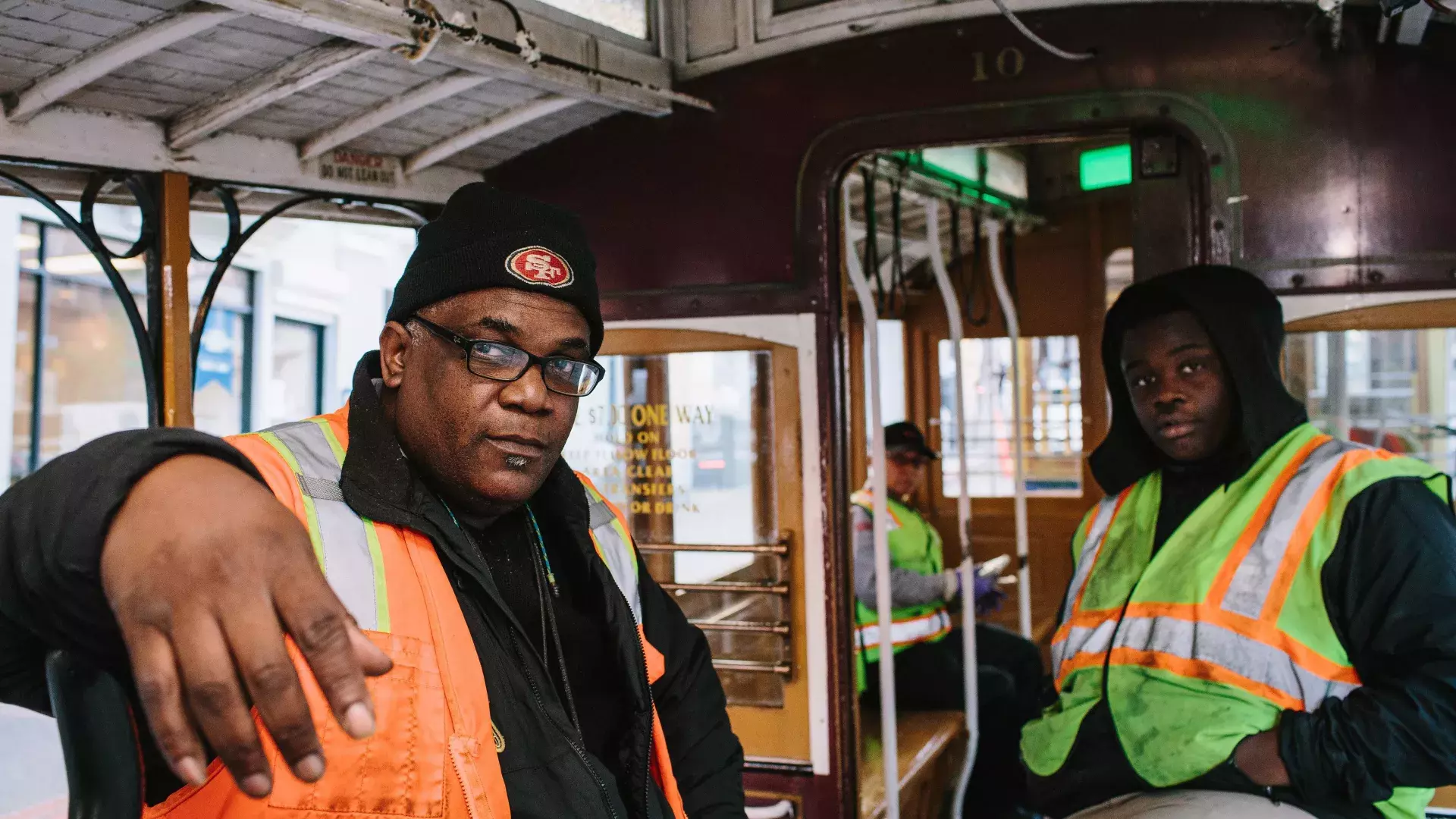 Ellis Cato and his son on a cable car.