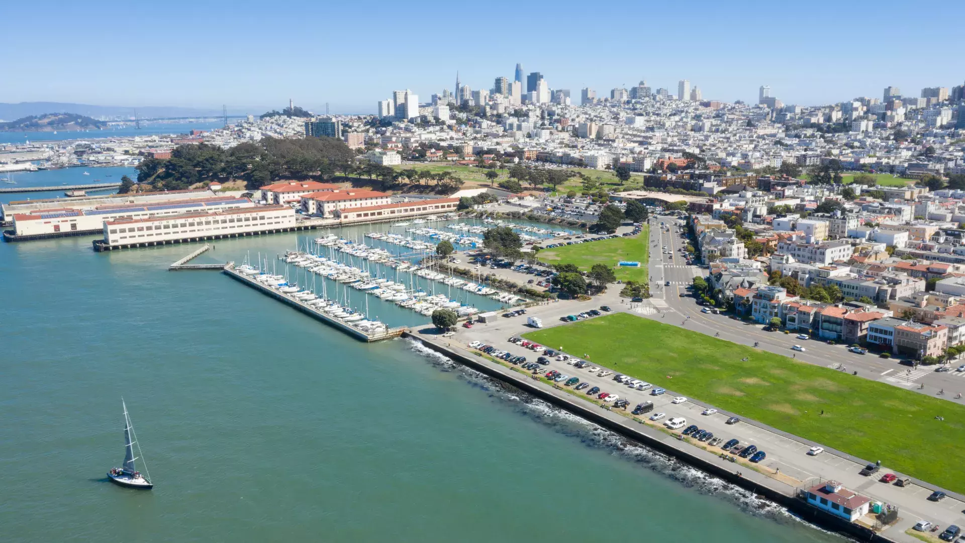 Aerial of Fort Mason with the San Francisco skyline in the distance.