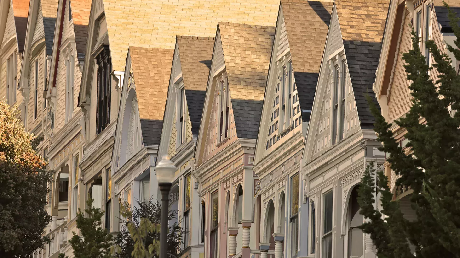 Close up of a row of Victorian houses in the Castro district of San Francisco.