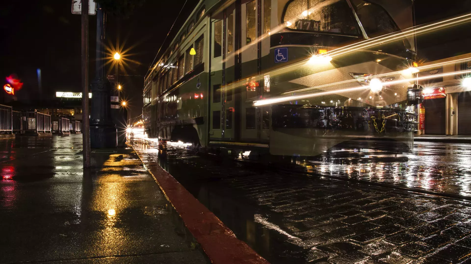 Streetcar at night in the rain