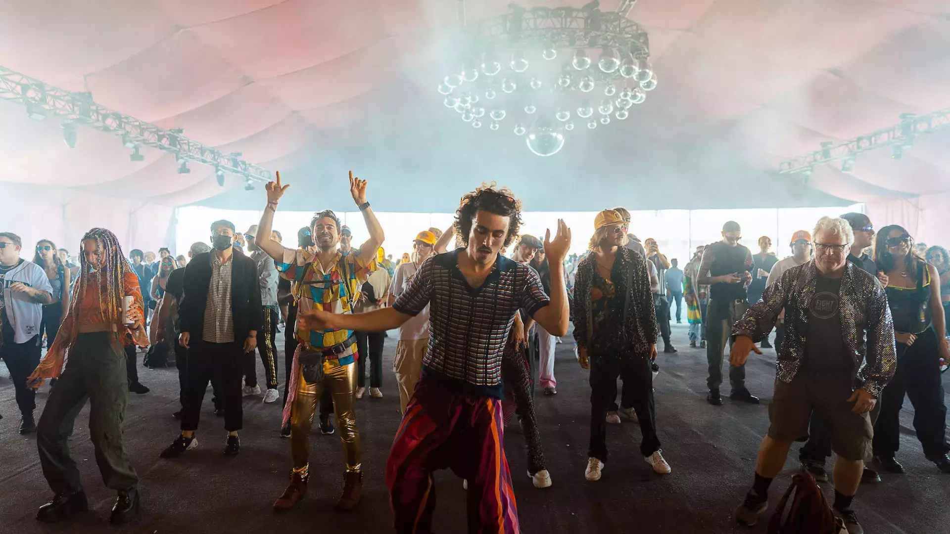 Festival attendees dance at the Portola Music Festival