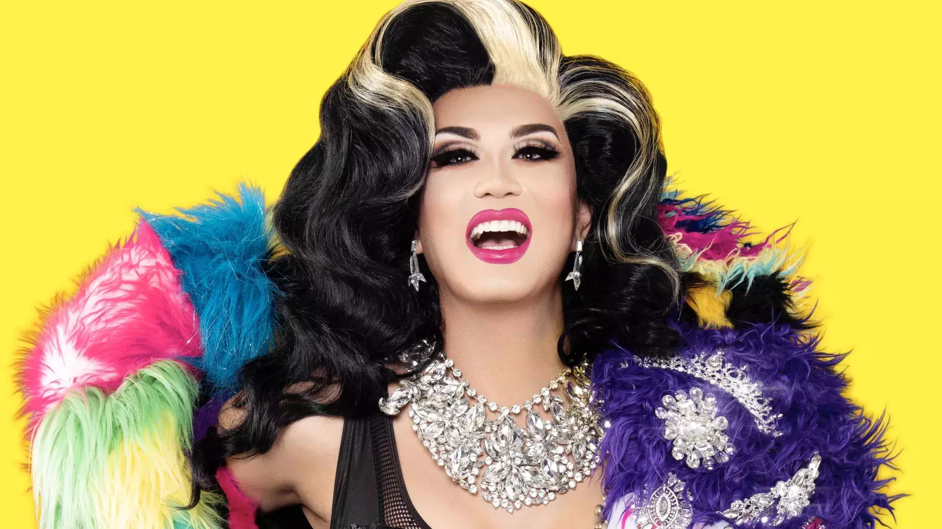 Drag Queen Manila Luzon with a yellow background