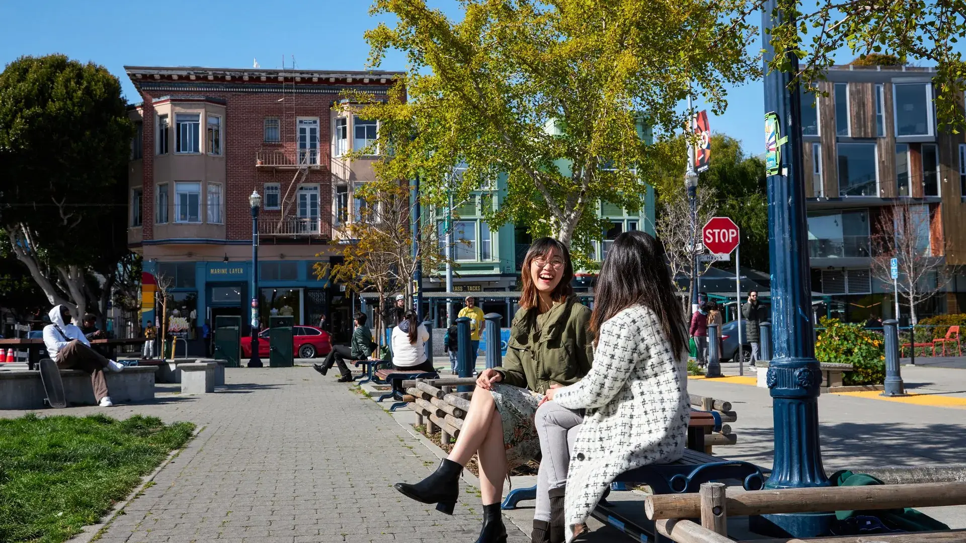 Women sit outside at Patricia's Green in San Francisco's Hayes Valley.