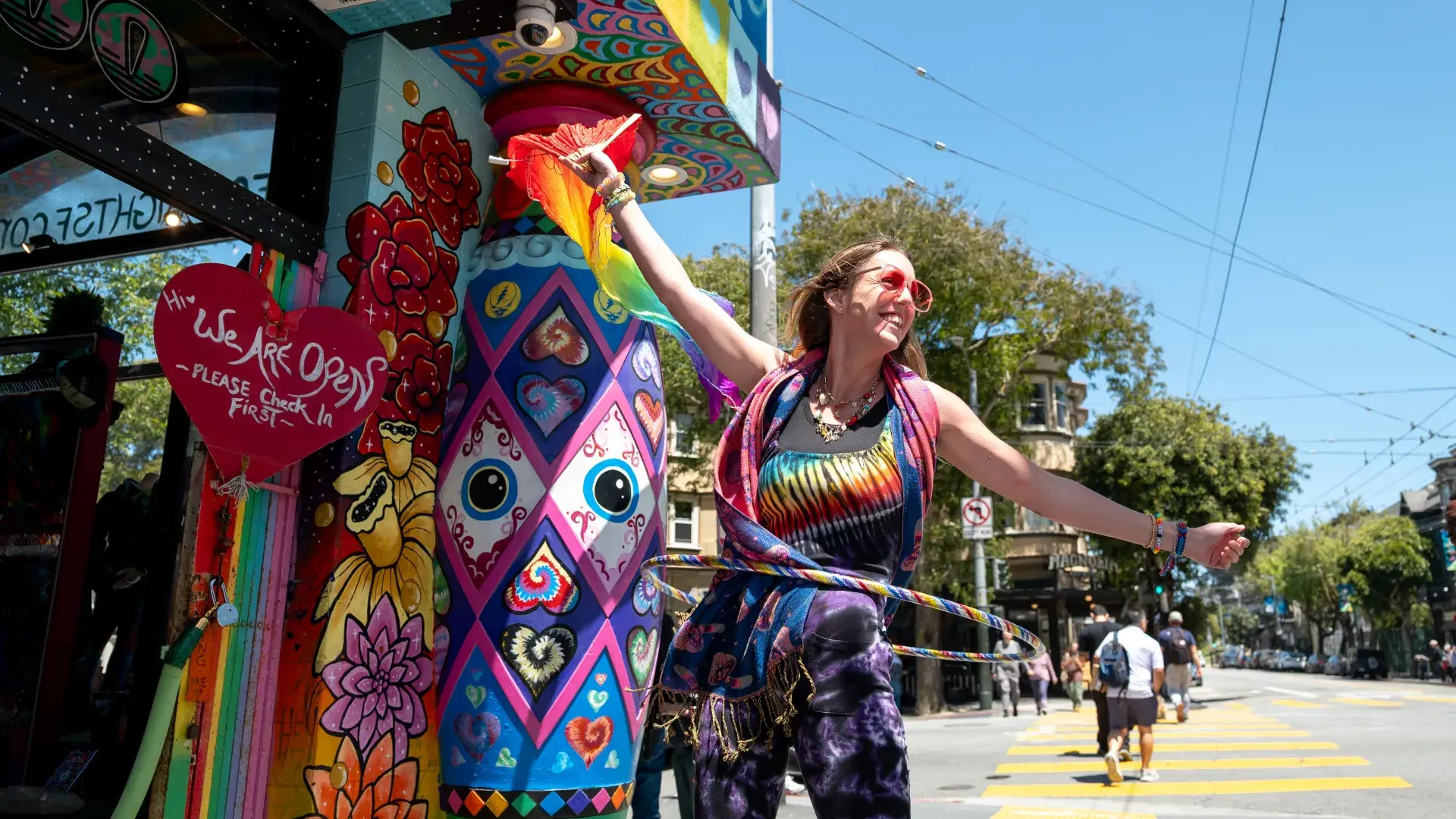Staff at Love On Haight greet visitors to the neighborhood