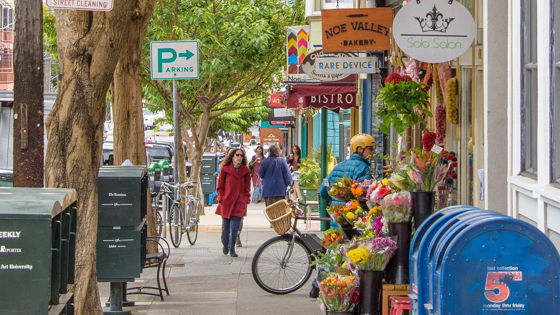 Woman walking down street in Noe Valley