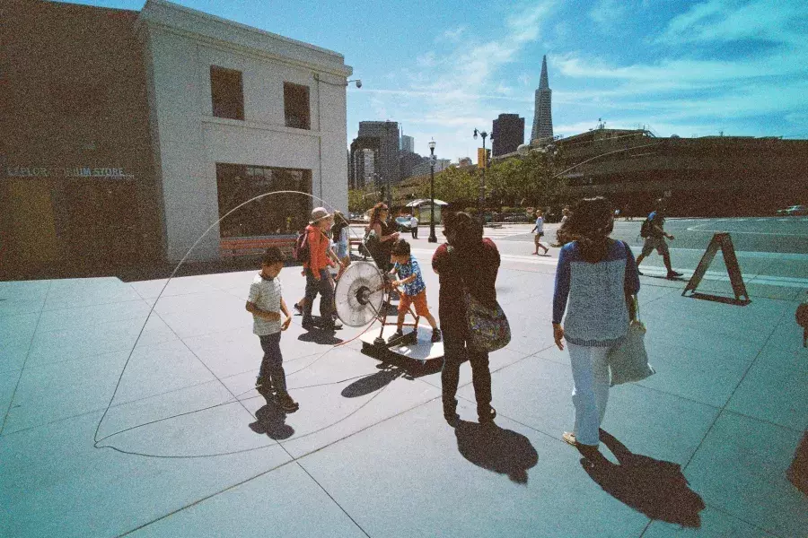 Kids playing outside of the Exploratorium