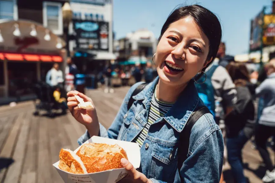 Woman with chowder at PIER 39