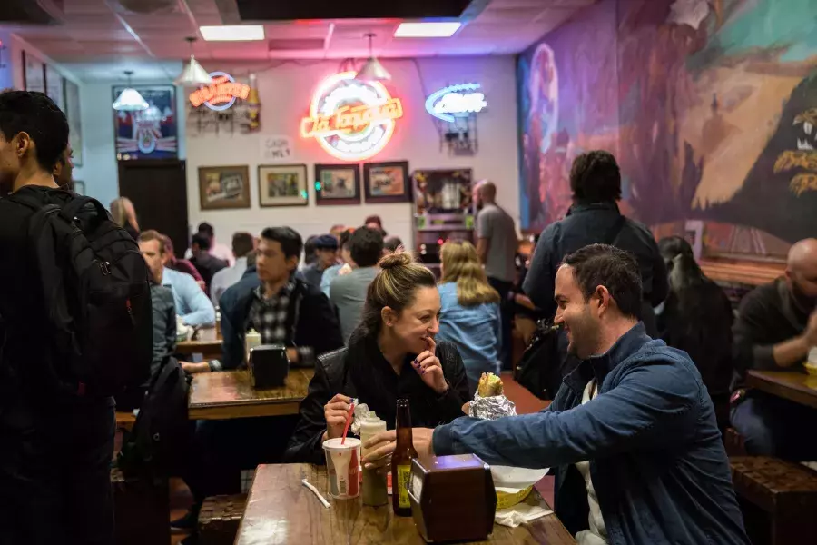 Visitors enjoy authentic Mexican food in San Francisco's Mission neighborhood.