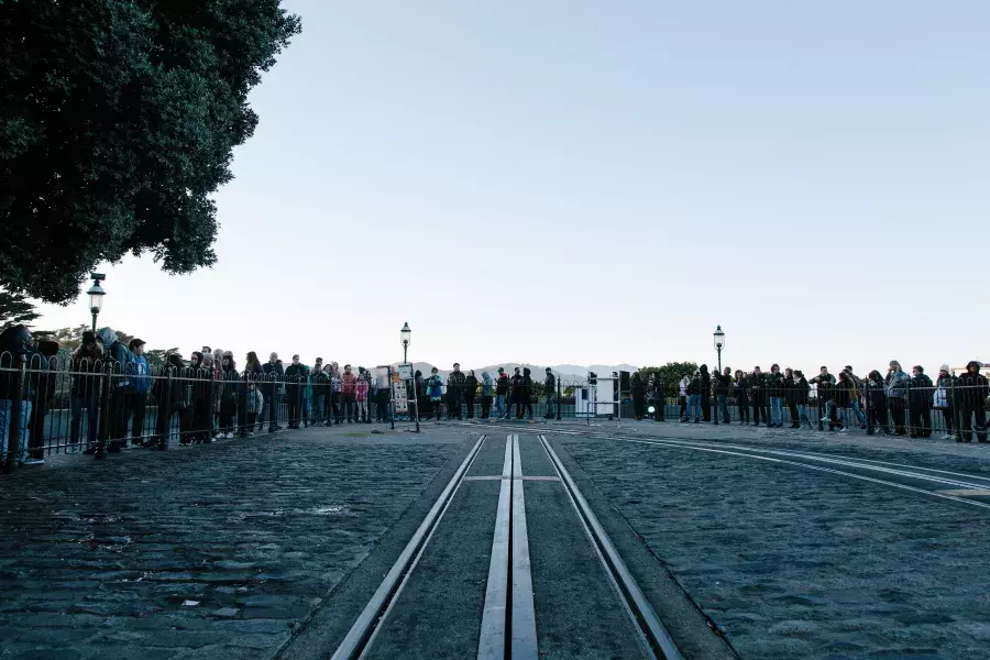 A crowd waiting in line for the cable car.