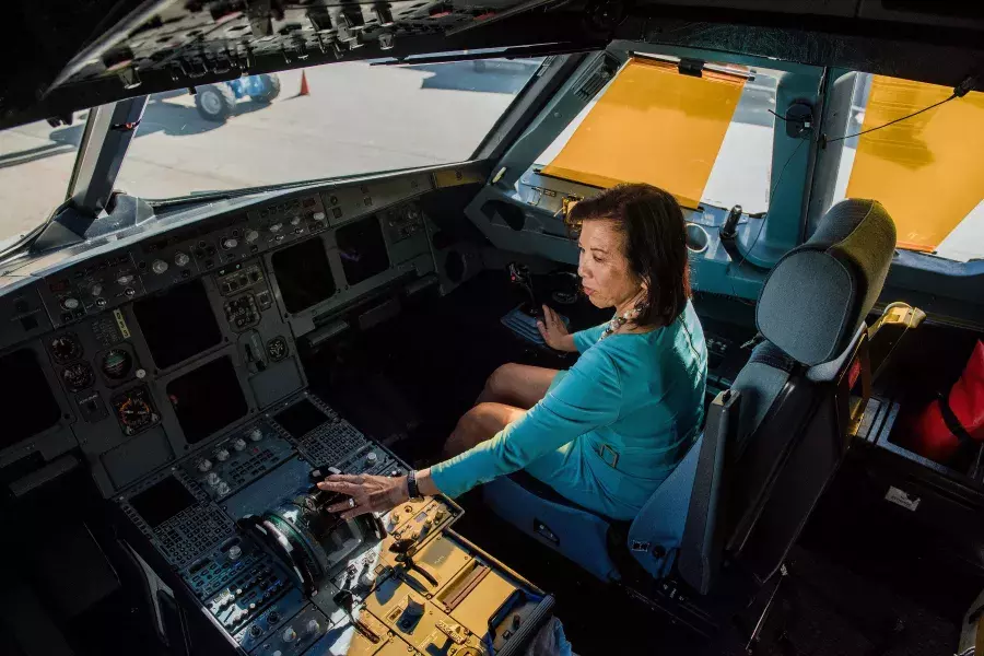 Melinda Yee Franklin sitting in the cockpit.