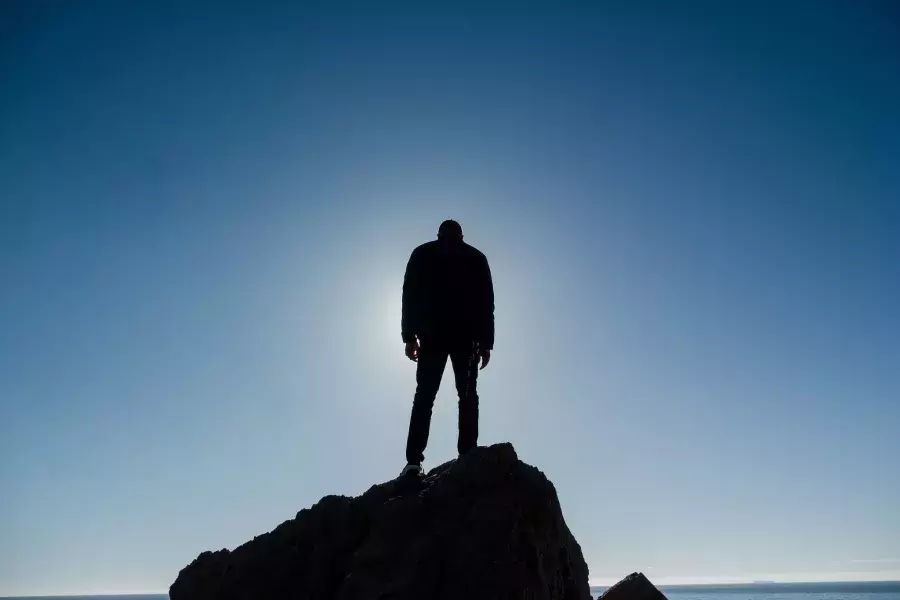 Nick Whittlesey standing on a rock.