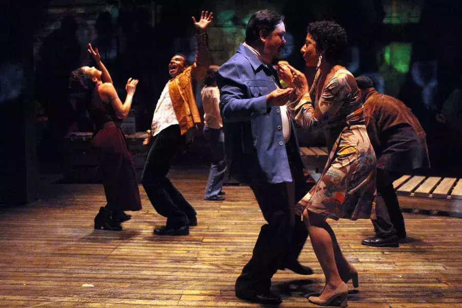 Performers in mid-20th century costume dance on stage at the Magic Theatre during a performance of "Gangster of Love."