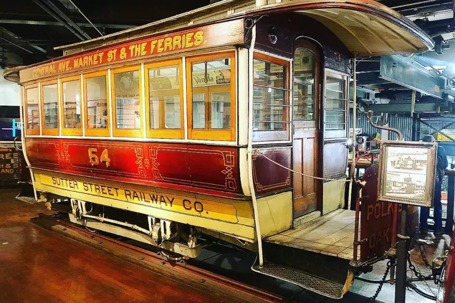 A vintage cable car on display at the San Francisco Cable Car Museum.