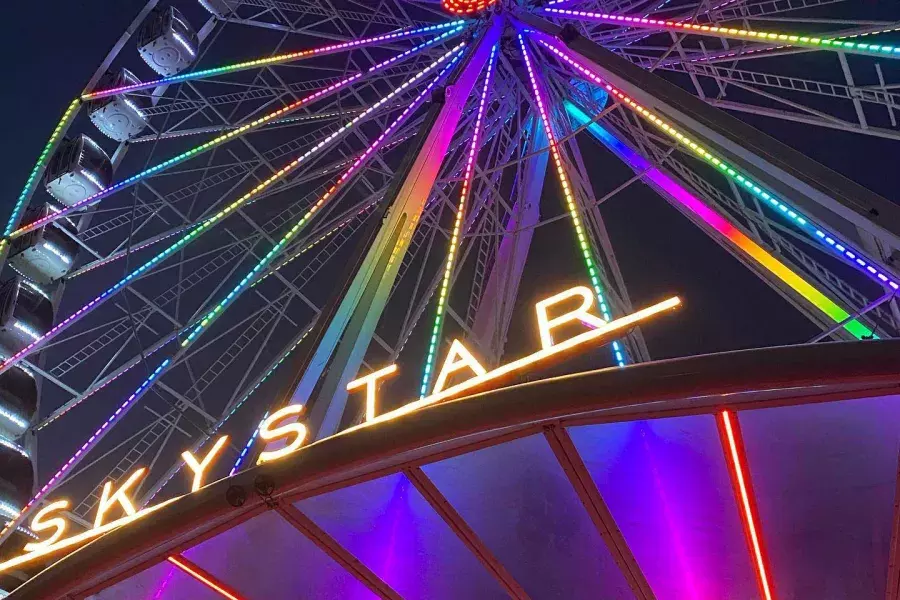 Close up view of the neon lights of the SkyStar ferris wheel in Golden Gate Park. San Francisco, California.