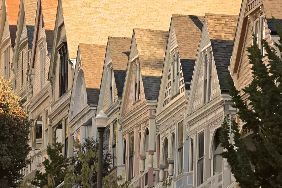 Close up of a row of Victorian houses in the Castro district of San Francisco.