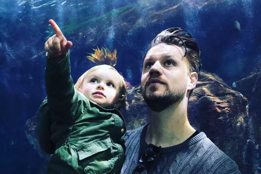 Man and child in Aquarium tunnel