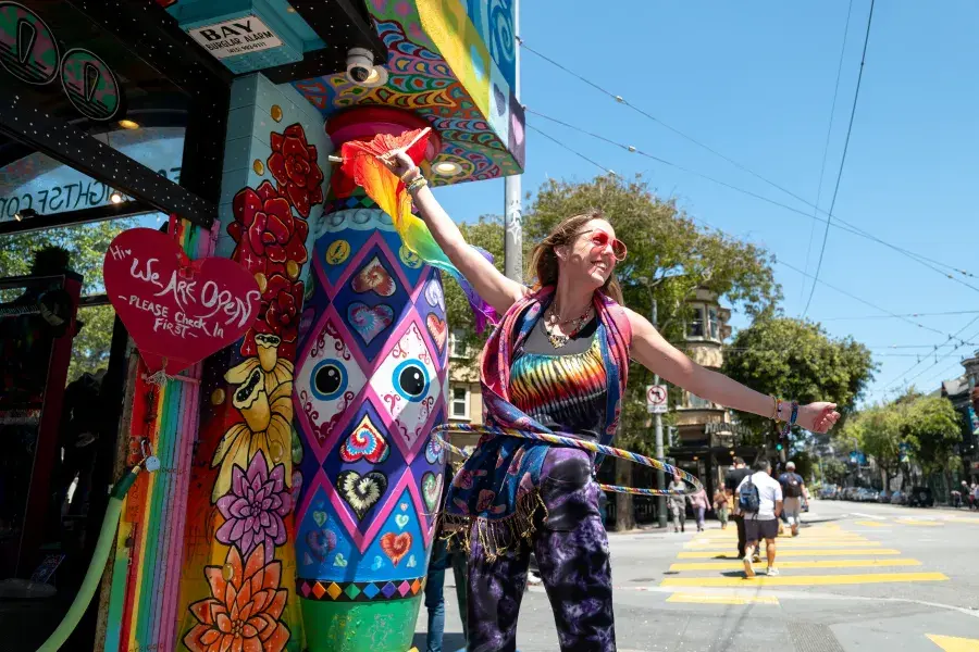 Staff at Love On Haight greet visitors to the neighborhood
