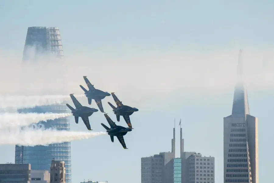 Blue angels flying past Salesforce Tower on Fleet Week