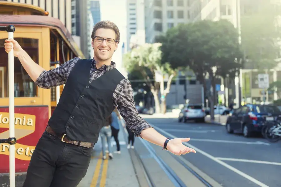 Man riding trolley in downtown San Francisco