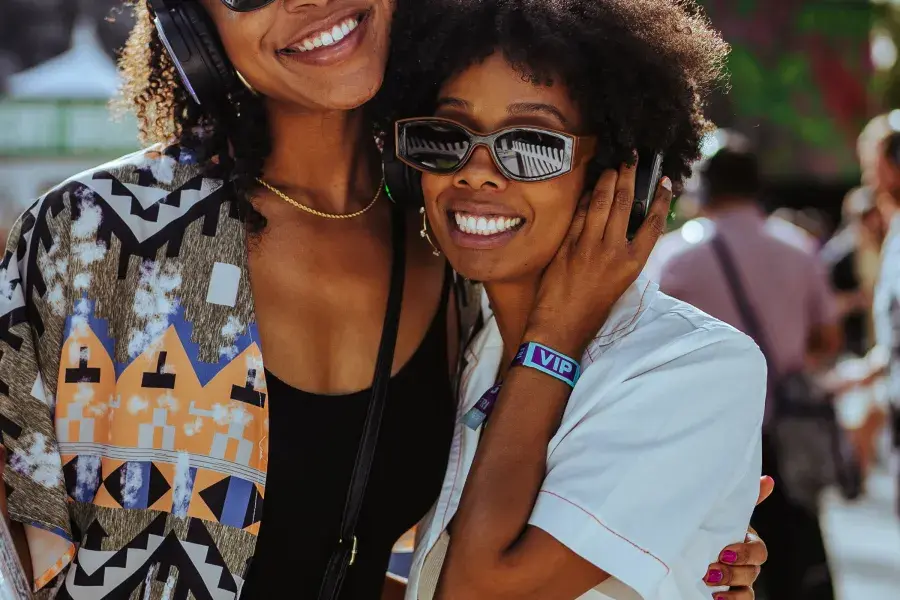 Friends embracing at BottleRock Festival in Napa