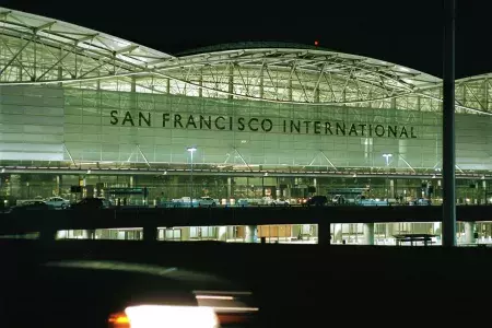 Exterior view of San Francisco International Airport (SFO) at night.