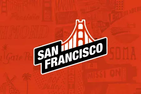 The San Francisco Travel Association logo is pictured on a red background with illustrated graphics.