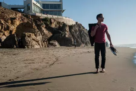 Nick Whittlesey barefoot on Ocean Beach