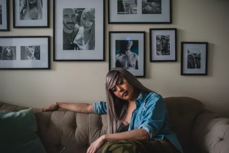 Portrait of Nya Cruz on the couch.