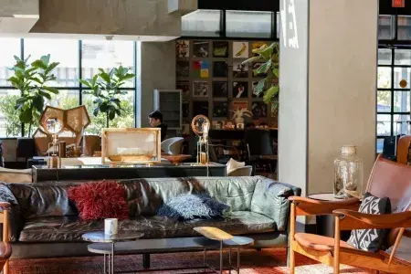 Interior of Hotel Kabuki, stylish couch, wood accents.