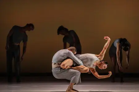 Dancers in the ODC company perform on stage.