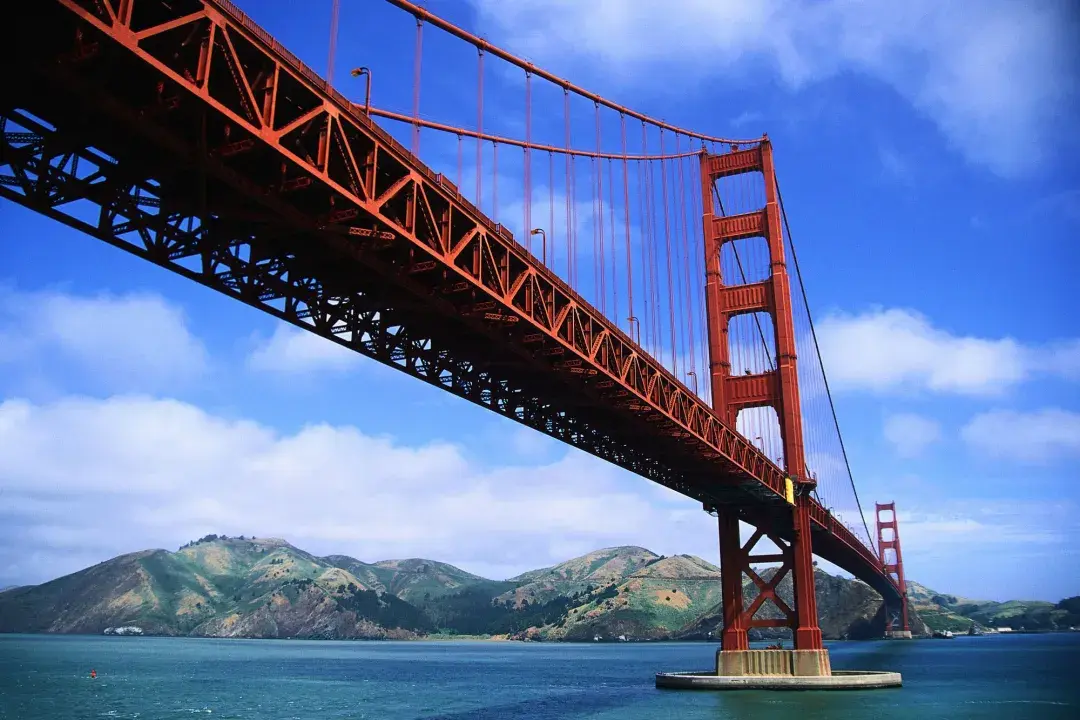 The iconic Golden Gate Bridge is seen from below. San Francisco, California.
