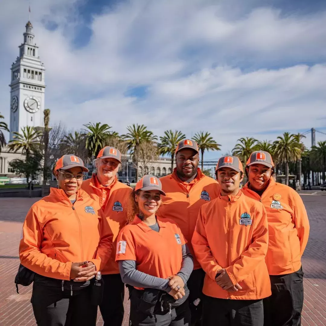 San Francisco's Welcome Ambassadors prepare to greet visitors at the Ferry Building.