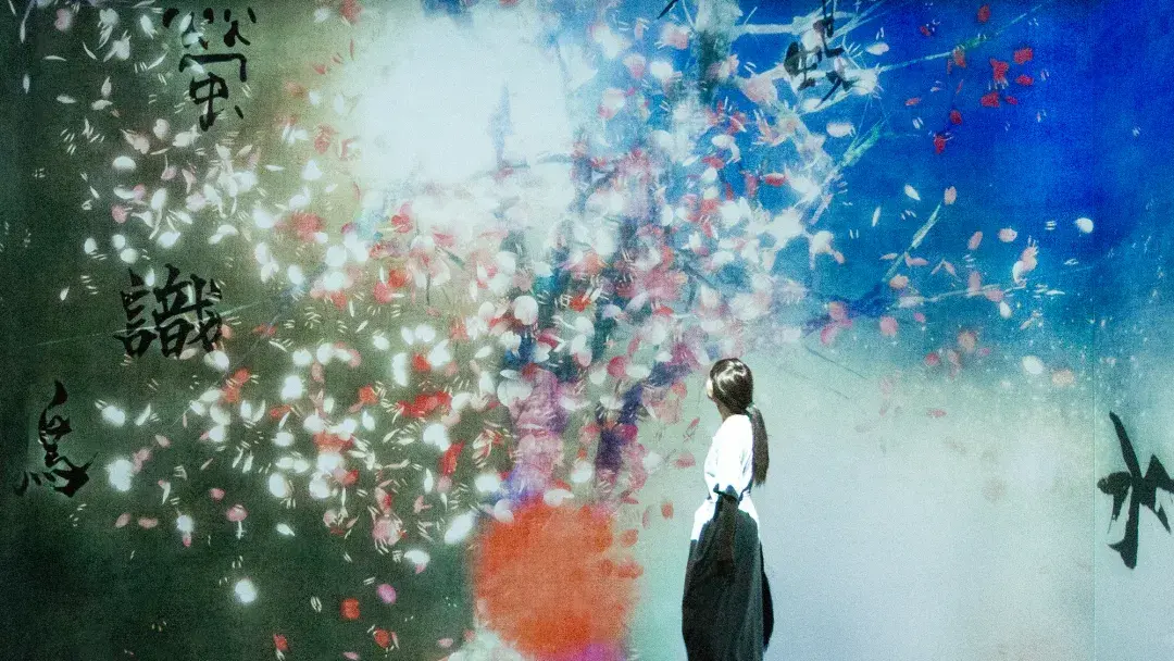 A visitor explores a special exhibition at the Asian Art Museum