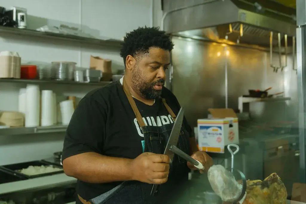 Chef and owner of Gumbo Social, Dontaye Ball