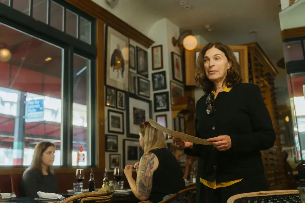 Lidia Valledor at work in North Beach's Cafe Zoetrope