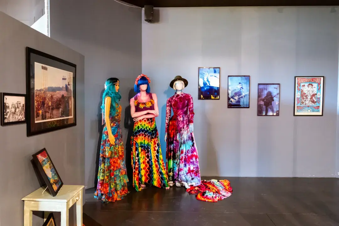Clothes, photographs, and concert posters on display at The Counterculture Museum