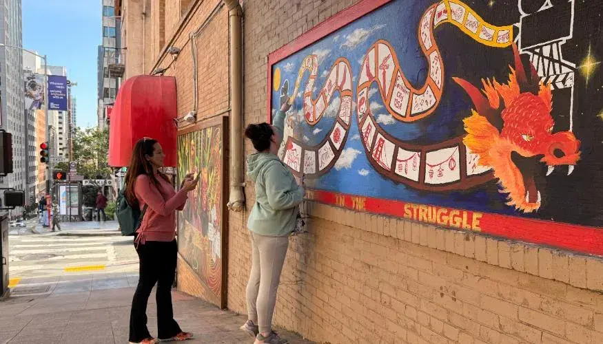 Visitors complete the Urban Adventure Quest in San Francisco's Chinatown.