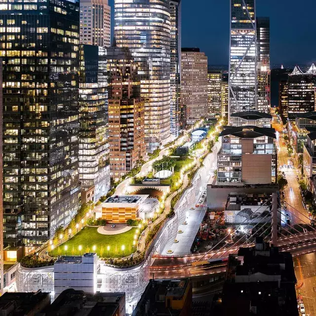 San Francisco's Salesforce Park lit up at night.