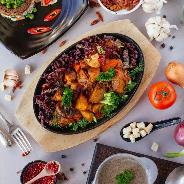 A table full of delicious vegetarian and vegan dishes.