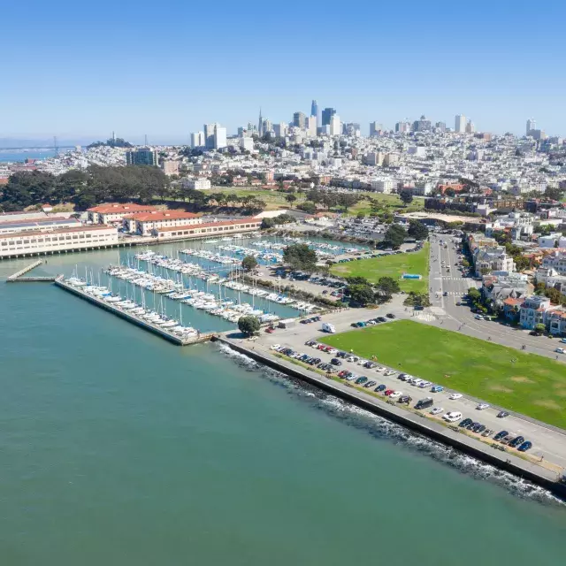 Aerial of Fort Mason with the San Francisco skyline in the distance.