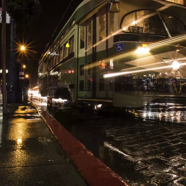 Streetcar at night in the rain