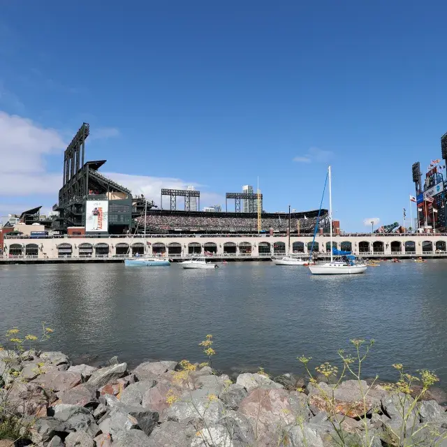 Boats in Mcovey park in the water outside the Giant's stadium on a sunny day