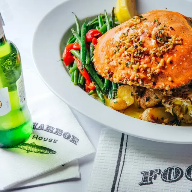 Crab next to beer glass