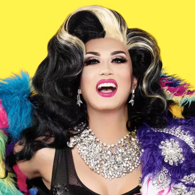 Drag Queen Manila Luzon with a yellow background