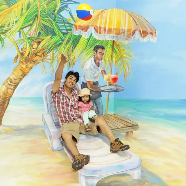 A father and baby visit the Museum of 3D Illusions